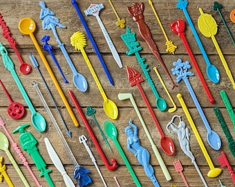 Vintage swizzle stick lot 25pc collection bar decor or party. Bright fun plastic souvenir drink stirrers for staging retro bar, man cave