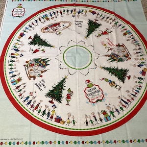 May include: A white circular fabric with a red border and a green and white border inside. The fabric features a Christmas scene with the Grinch and the Whos. The text "Merry Christmas" and "How the Grinch Stole Christmas!" is printed on the fabric.