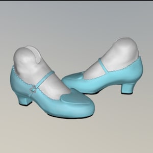 May include: A pair of light blue heeled shoes with a strap and a scalloped edge. The shoes have a heart-shaped buckle on the strap.