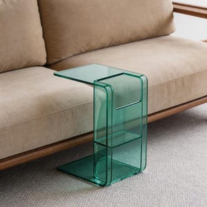 Moderne C-vormige acryl bijzettafel met opbergplank