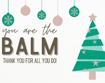Pode incluir: Gráfico com tema de feriado com uma árvore de Natal e enfeites. O texto diz "You are the BALM, Thank you for all you do!" em uma mistura de fontes e cores, em um fundo branco.