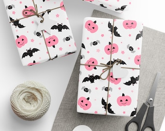 Roze Halloween-inpakpapier: pompoenen, vleermuizen, spinnen