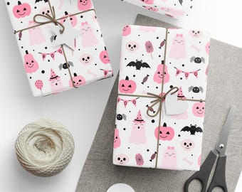 Roze Halloween-inpakpapier: geesten, pompoenen, vleermuizen