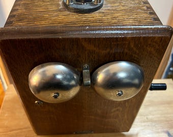 Vintage Century ringer box - with crank that rings the bells. From 1940s/50s. With internal parts.