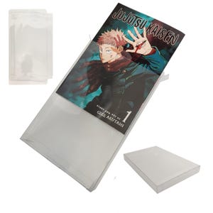 May include: A clear plastic protective sleeve containing the first volume of the Jujutsu Kaisen manga by Gege Akutami. The cover features a character with pink hair and a hand over their mouth. The sleeve is shown both empty and with the book.