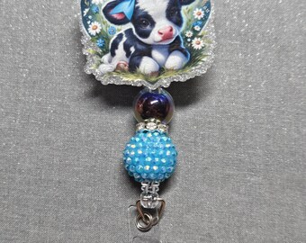 Badge reel heart flower blue cow