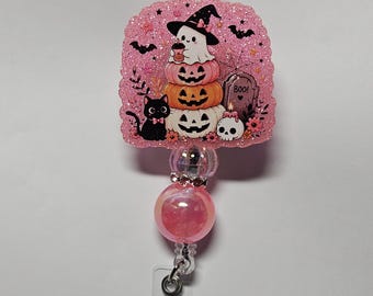 Badge reel pink ghost pumpkins