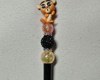 Beaded tiger black plastic pen