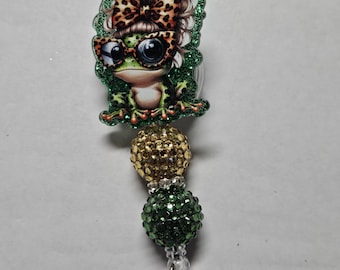 Badge reel green girl frog