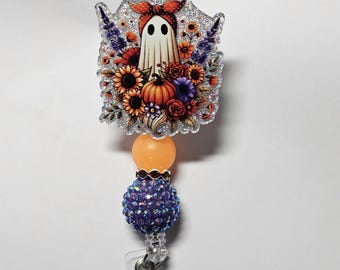 Badge reel ghost flowers