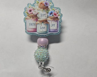 Badge reel faith love joy