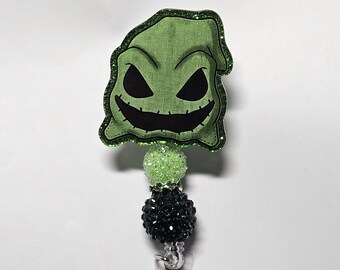 Badge reel green oogie face