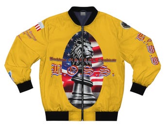 May include: A yellow bomber jacket with black trim and a zip fastening. The jacket has a central design of a lion's head on a chess piece, set against an American flag. The word "BOSS" is displayed.