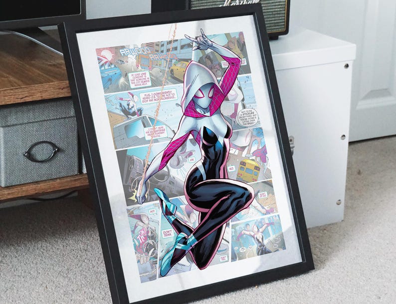 May include: A framed comic book print featuring a female superhero in a white hooded costume with pink accents. She is swinging from a web and has a black and white suit with a spider symbol on her chest. The print is surrounded by other comic book panels.