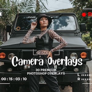 May include: A woman wearing a black leather top and leopard print shirt stands in front of a black jeep. The jeep has a red "REC" button on the side. The text "Camera Overlays" is written in white on a black background. The text "30 Premium Photoshop Overlays" is written in white on a black background. The text "TCG 00:15:03:10" is written in white on a black background.