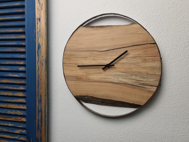 Wooden wall clock as a unique gift. Natural apple wood framed in a wine barrel ring with a quiet quartz clockwork. image 3