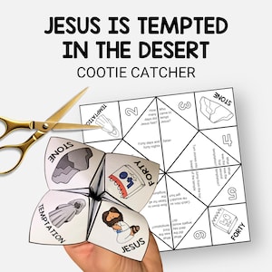May include: A white paper cootie catcher with the text "JESUS IS TEMPTED IN THE DESERT" and "COOTIE CATCHER". The cootie catcher is open, revealing illustrations and text. Gold scissors are next to the cootie catcher.