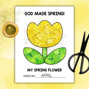 May include: A spring-themed artwork featuring a yellow flower with green leaves, the text "GOD MADE SPRING!" and "MY SPRING FLOWER". The artwork is signed "APRIL". A small jar of gold glitter and a pair of black scissors are also in the image.