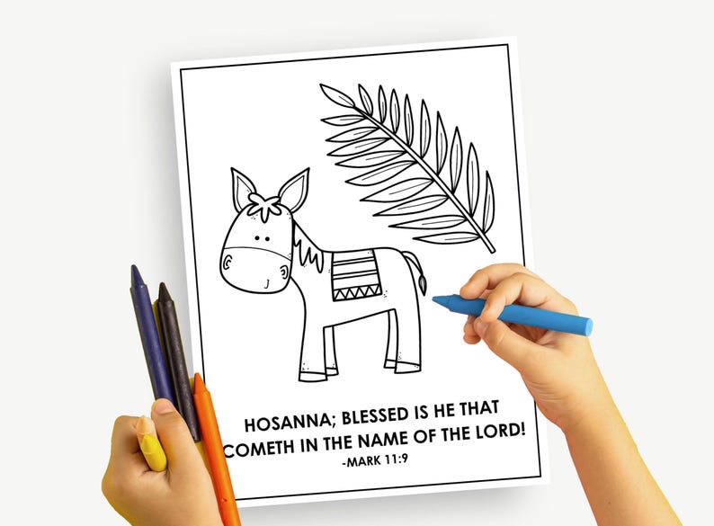 May include: Black and white line drawing of a donkey and palm branch, with the text "HOSANNA; BLESSED IS HE THAT COMETH IN THE NAME OF THE LORD! -MARK 11:9". A child's hand holds a blue crayon, ready to color the image.