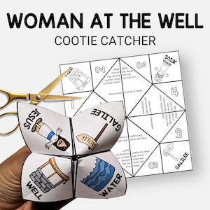 May include: A folded paper cootie catcher with illustrations and text related to the story of the Woman at the Well. The cootie catcher is held by a hand, with gold scissors nearby. The text "WOMAN AT THE WELL" is at the top.