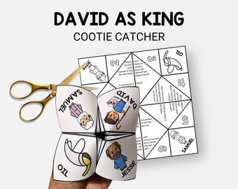 May include: A white paper cootie catcher with the text "DAVID AS KING" and illustrations. The cootie catcher is folded and held open, with the words "OIL", "DAVID", "JESSE", and "SAMUEL" visible. Gold scissors are next to the cootie catcher.