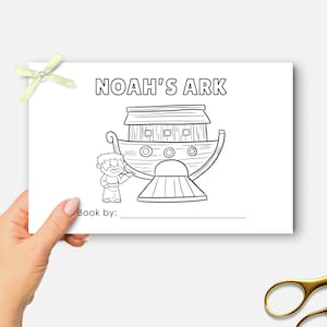 May include: Black and white line drawing of Noah's Ark with a man standing next to it. The text "Noah's Ark" is at the top of the page. The text "Book by:" is at the bottom of the page.