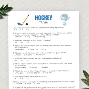 May include: A printable hockey trivia quiz with 11 questions. The quiz features a hockey stick, a puck, and a trophy. The questions cover topics such as the number of players on the ice, penalties, and the names of different hockey plays.