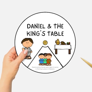 May include: A white circle with the text "DANIEL & THE KING'S TABLE" and an illustration of a table with food, a pitcher, and three people. The text below the circle reads "Daniel and his friends were taken to serve in the king's palace in Babylon."