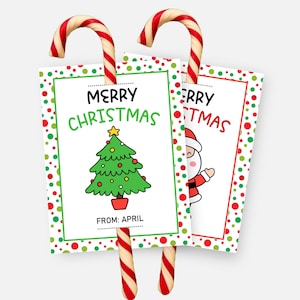 May include: Two Christmas gift tags with candy cane handles. One tag features a green Christmas tree and the text "MERRY CHRISTMAS" and "FROM: APRIL". The other tag has Santa Claus and the text "MERRY CHRISTMAS". Both tags have a white background with red and green polka dots.