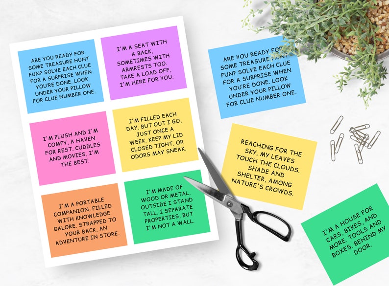 May include: Nine colorful sticky notes with text on them. The notes are on a white surface with a pair of silver scissors and paper clips. The text on the notes includes: "Are you ready for some treasure hunt fun? Solve each clue for a surprise when you're done. Look under your pillow for clue number one.", "I'm plush and I'm comfy, a haven for rest. Cuddles and movies, I'm the best.", "I'm a seat with a back, sometimes with armrests too. Take a load off, I'm here for you.", "I'm filled each day, but out I go, just once a week. Keep my lid closed tight, or odors may sneak.", "I'm a portable companion, filled with knowledge galore, strapped to your back, an adventure in store.", "I'm made of wood or metal, outside I stand tall I separate properties, but I'm not a wall.", "Are you ready for some treasure hunt fun? Solve each clue for a surprise when you're done. Look under your pillow for clue number one.", "Reaching for the sky, my leaves touch the clouds. Shade and shelter, among nature's crowds.", "I'm a house for cars, bikes, and more. Tools and boxes, behind my door."