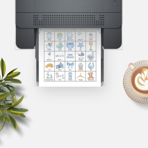 May include: A printable baby shower bingo card with blue and yellow illustrations of baby items. The card has a free space in the center and is ready to be printed.