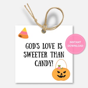 May include: White printable tag with a black and white text that reads "God's love is sweeter than candy!" with a small orange and yellow candy corn illustration and a pumpkin shaped candy bucket with a black face and candy inside. The tag has a pink circle with the text "Instant Download" in white.