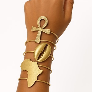 Bracciale artigianale in bronzo africano, ciprea o ankh - Gioielli unici e particolari