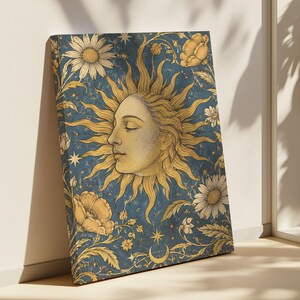 May include: A rectangular canvas print featuring a central sun face with closed eyes and radiating golden rays against a deep blue background. The artwork is decorated with gold-toned illustrations of daisies, poppies, stars, and a crescent moon.
