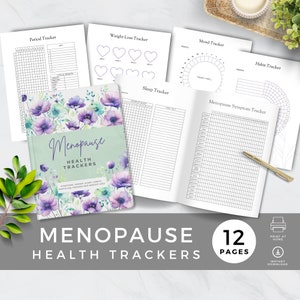 May include: A set of printed health trackers for menopause. The journal cover is light green with purple floral designs and the word "Menopause" in script. The trackers include sections for periods, weight loss, mood, sleep, and habits. The image also includes the text "12 pages."