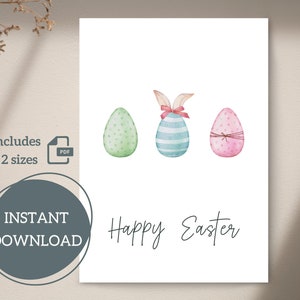 May include: Printable Happy Easter card featuring three watercolour Easter eggs. The eggs are decorated with polka dots, stripes, and a bow. The text "Happy Easter" is written in cursive below the eggs.