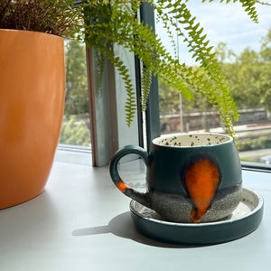 Teacup | Coffee cup | Decorated with an &quot;Orange Lava&quot; | Handmade from ceramic | Designer cup
