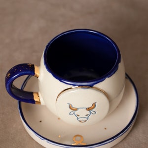 Tea cup | Coffee cup | Decorated with &quot;Zodiac sign - Taurus&quot; | Handmade from ceramic | With real gold elements | Designer cup