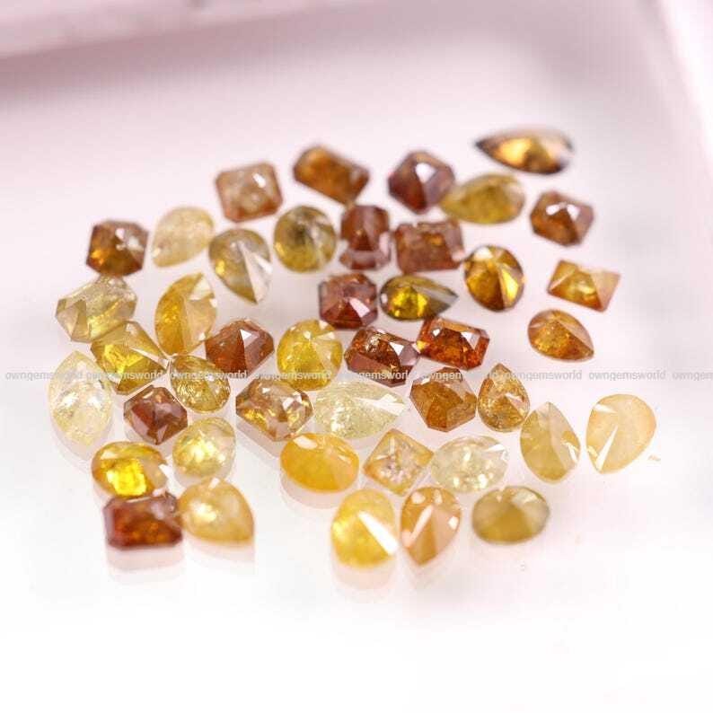 Natural Rustic Yellow & Brown Diamond Lot, Mixed Shape Rose Cut Loose Diamonds, Real Earth-Mined Stones for Custom Jewelry
brilliant cut diamonds, mixed color diamonds, brown brilliant diamond, salt and pepper diamonds, fancy color loose diamonds, wholesale diamond lot, loose diamonds for jewelry, handmade jewelry supplies, mixed brilliant cut gems, rustic round diamonds, jewelry designers diamonds, fine jewelry stones, wholesale gemstone supply, brilliant cut diamond mix