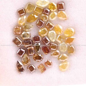 Natural Rustic Yellow & Brown Diamond Lot, Mixed Shape Rose Cut Loose Diamonds, Real Earth-Mined Stones for Custom Jewelry
brilliant cut diamonds, mixed color diamonds, brown brilliant diamond, salt and pepper diamonds, fancy color loose diamonds, wholesale diamond lot, loose diamonds for jewelry, handmade jewelry supplies, mixed brilliant cut gems, rustic round diamonds, jewelry designers diamonds, fine jewelry stones, wholesale gemstone supply, brilliant cut diamond mix
