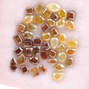 Natural Rustic Yellow & Brown Diamond Lot, Mixed Shape Rose Cut Loose Diamonds, Real Earth-Mined Stones for Custom Jewelry
brilliant cut diamonds, mixed color diamonds, brown brilliant diamond, salt and pepper diamonds, fancy color loose diamonds, wholesale diamond lot, loose diamonds for jewelry, handmade jewelry supplies, mixed brilliant cut gems, rustic round diamonds, jewelry designers diamonds, fine jewelry stones, wholesale gemstone supply, brilliant cut diamond mix