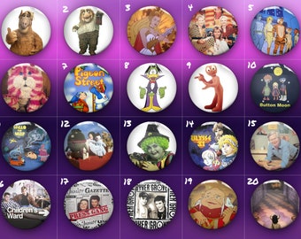 May include: A collection of 20 round buttons featuring various cartoon characters and television shows from the 1970s and 1980s. The buttons are arranged in a grid of four rows and five columns. Each button has a white background and a colorful image of a cartoon character or television show.