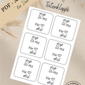 May include: A sheet of white stickers with the text "Für dich" and a heart symbol. The stickers are designed for gift packaging. The image also includes the words "PDF - A4 Vorlage" and "Tütenklappe". A "Download" button is visible.