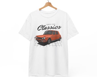 May include: White t-shirt with a vintage orange car illustration and the text "Drive the Classics" in black.