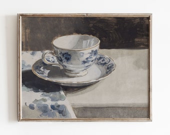 May include: A watercolor painting of a white teacup and saucer with a blue and white floral pattern. The teacup and saucer are on a white surface with a blue and white patterned cloth in the background.