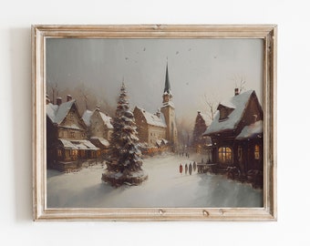 May include: A painting of a snowy village scene with a church steeple in the background and a Christmas tree in the foreground. The painting is framed in a light wood frame.