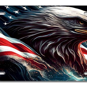 May include: A bald eagle with a golden beak is shown with its head turned to the right. The eagle is partially obscured by a waving American flag with red and white stripes and blue stars.