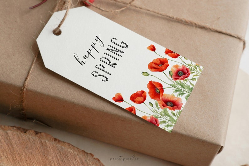 May include: White gift tag with the text "happy spring" in black cursive lettering. The tag is decorated with a border of red poppy flowers.