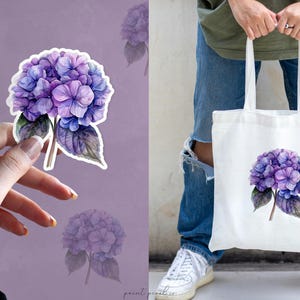 May include: A white tote bag with a purple and blue watercolor hydrangea flower design.