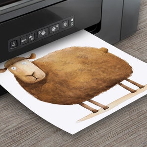 May include: A brown sheep with a white background is being printed from a black printer.